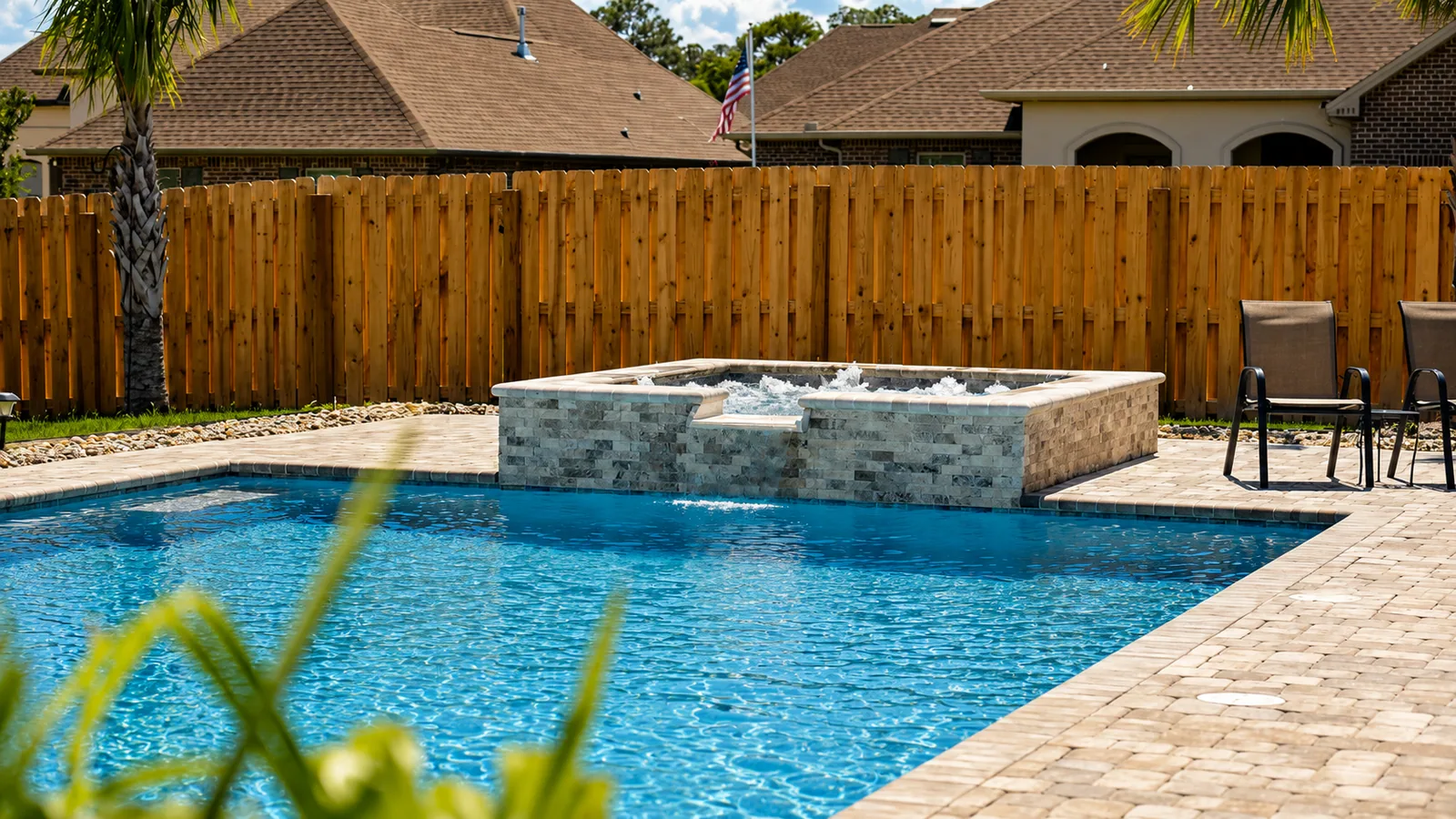 Finished Neway Pools backyard with patio living space