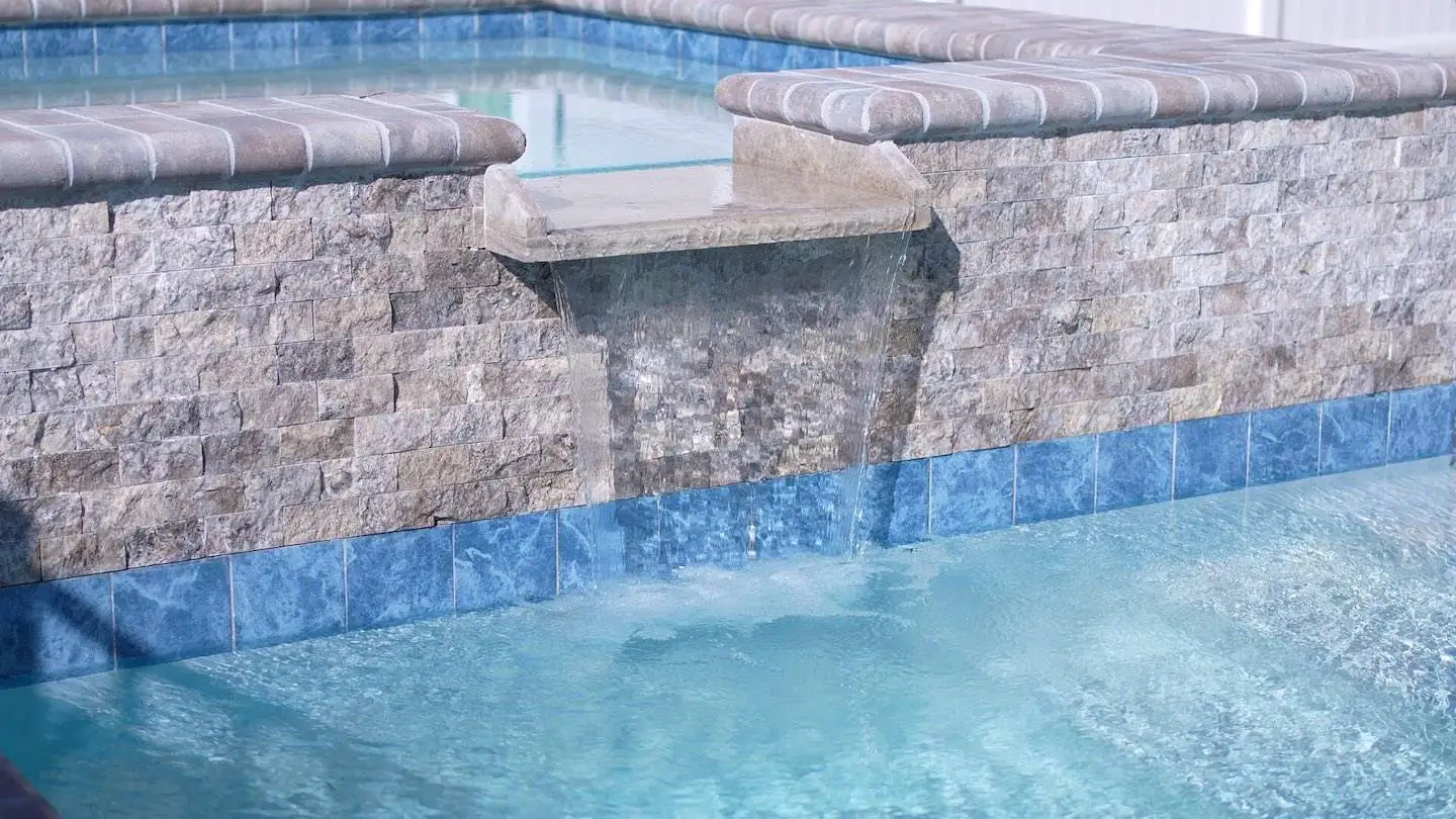 waterfall spillway from spa into pool