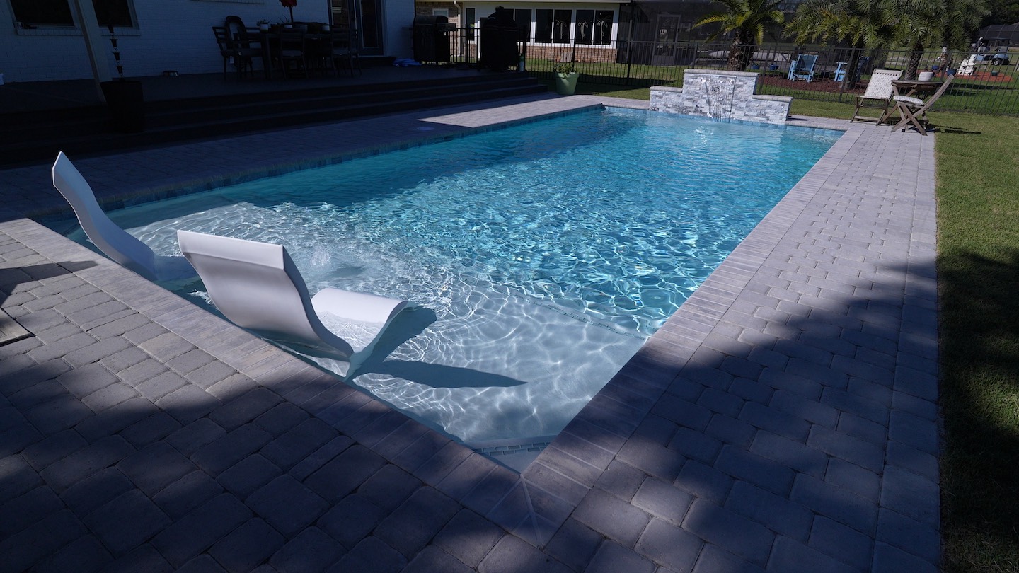 pool, tanning ledge, loungers, fort walton beach pool builder