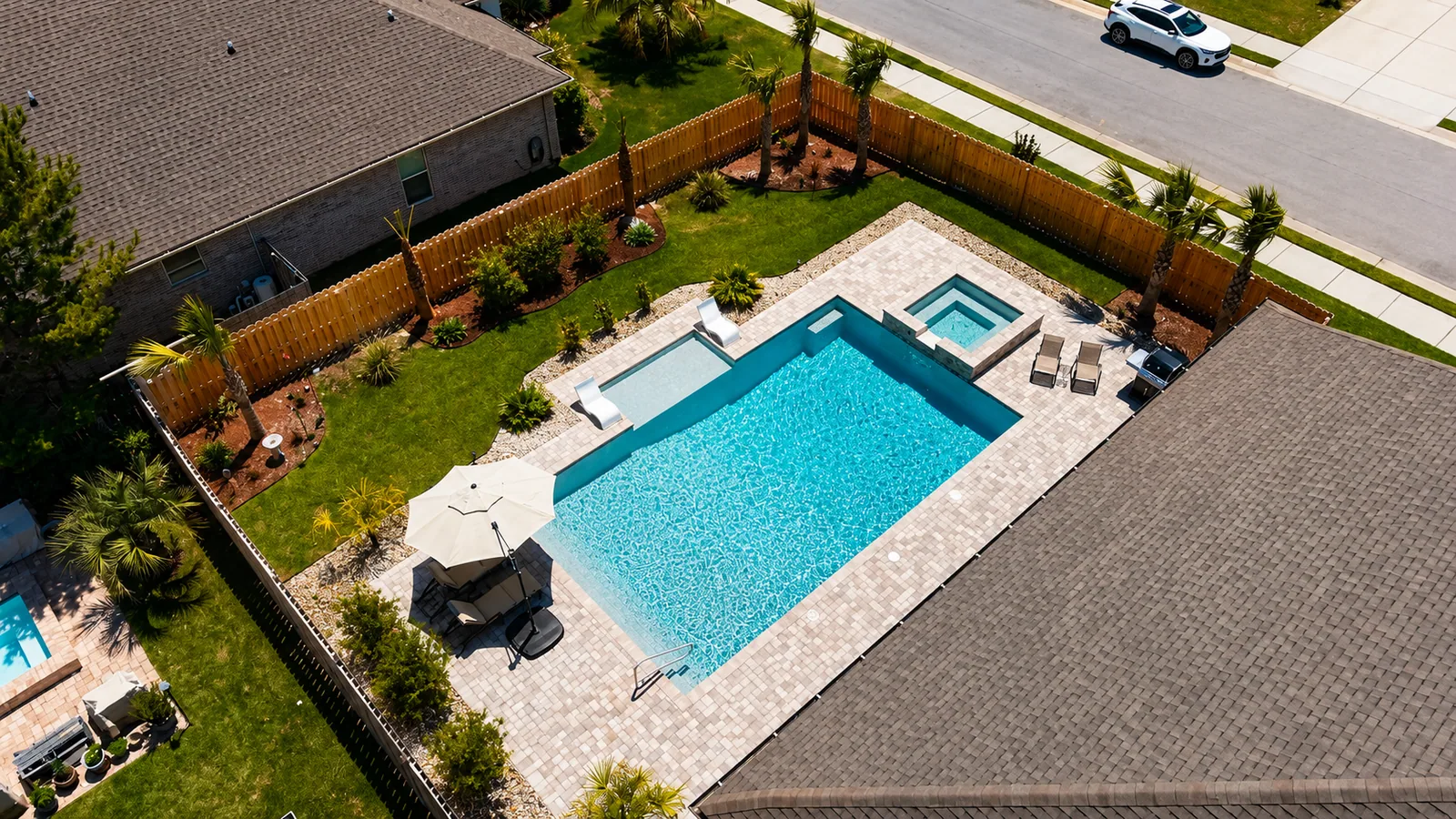 Aerial view of a completed Neway Pools backyard pool
