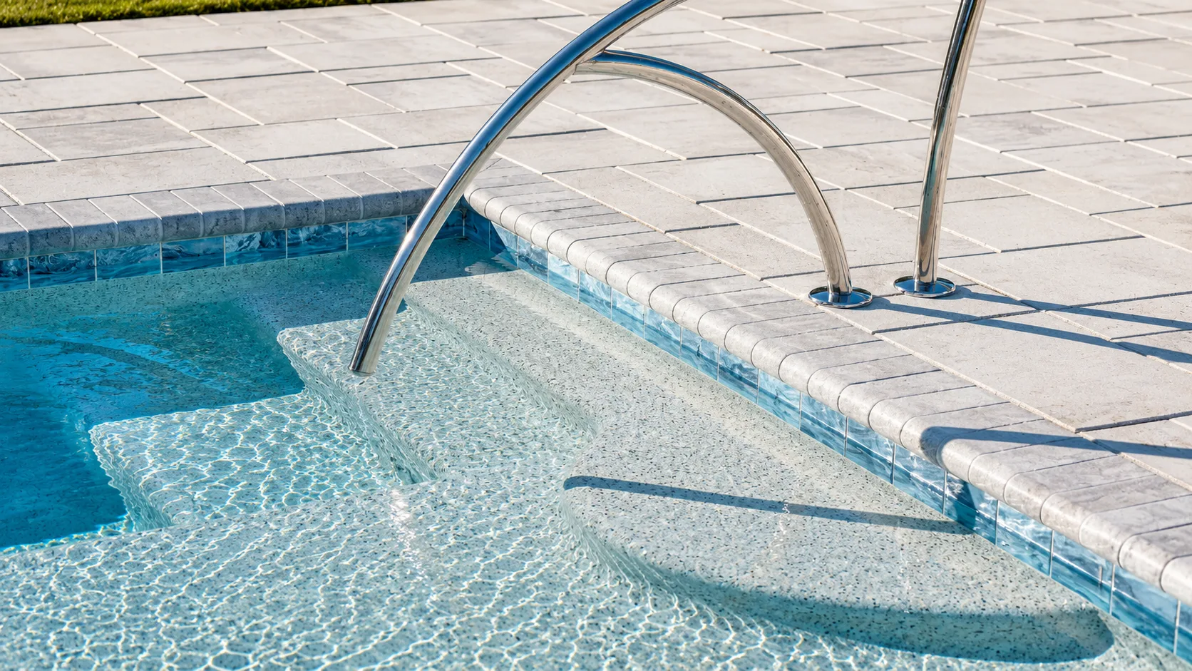 Completed custom swimming pool built by Neway Pools