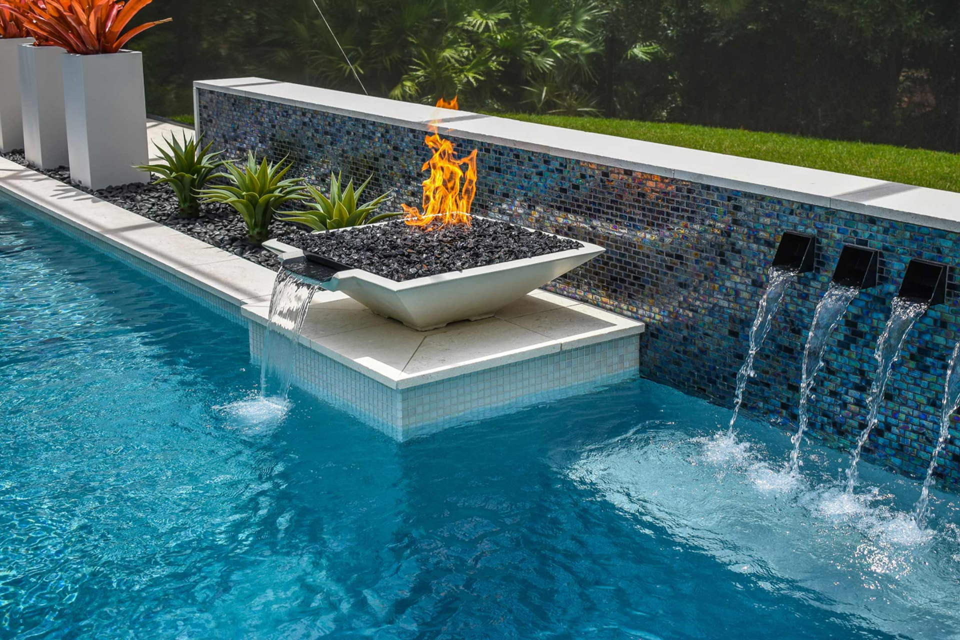 Aerial view of a Neway rectangular pool with spa and paver deck