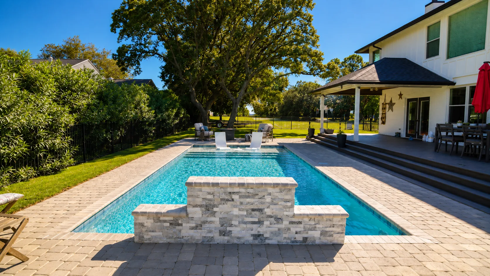 Water feature on a completed Neway Pools swimming pool