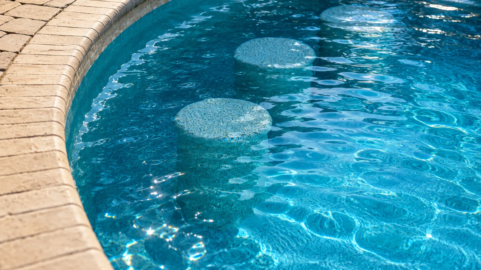 Water feature on a completed Neway Pools swimming pool