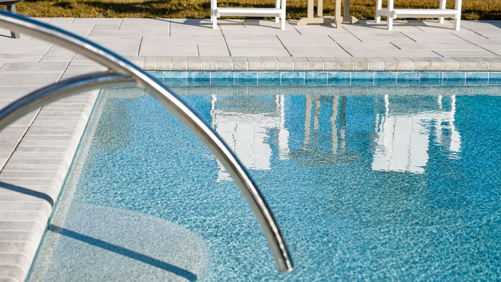 Pool entry steps and tanning ledge on a Neway Pools project