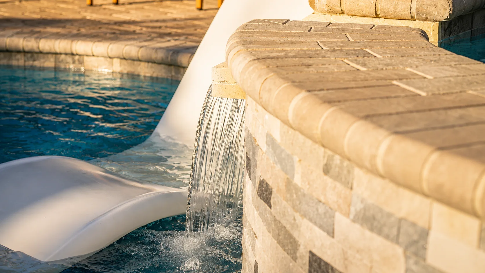 Water feature on a completed Neway Pools swimming pool Water feature on a completed Neway Pools swimming pool