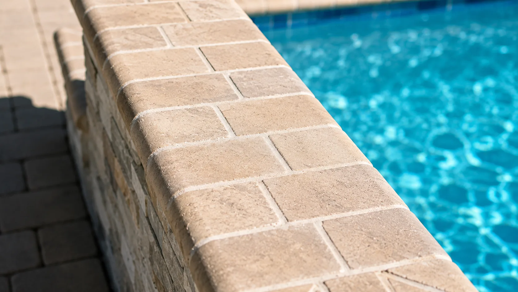 Aerial view of a custom backyard pool built by Neway Pools
