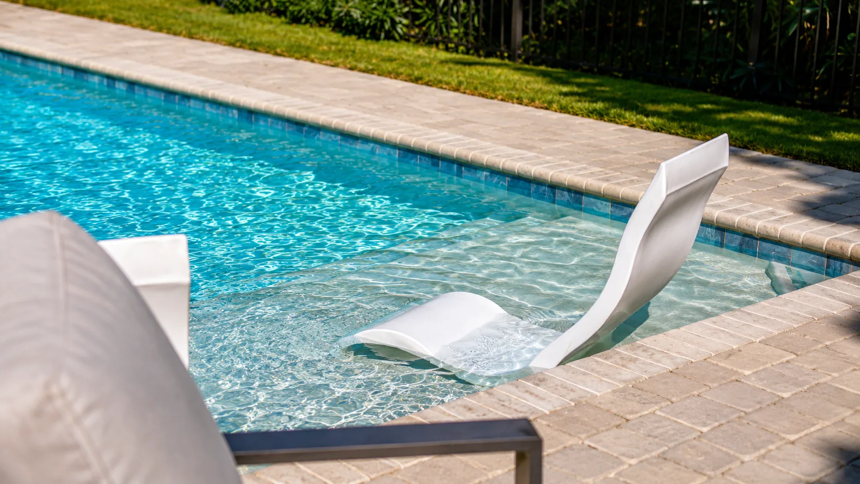Water feature on a completed Neway Pools swimming pool Water feature on a completed Neway Pools swimming pool