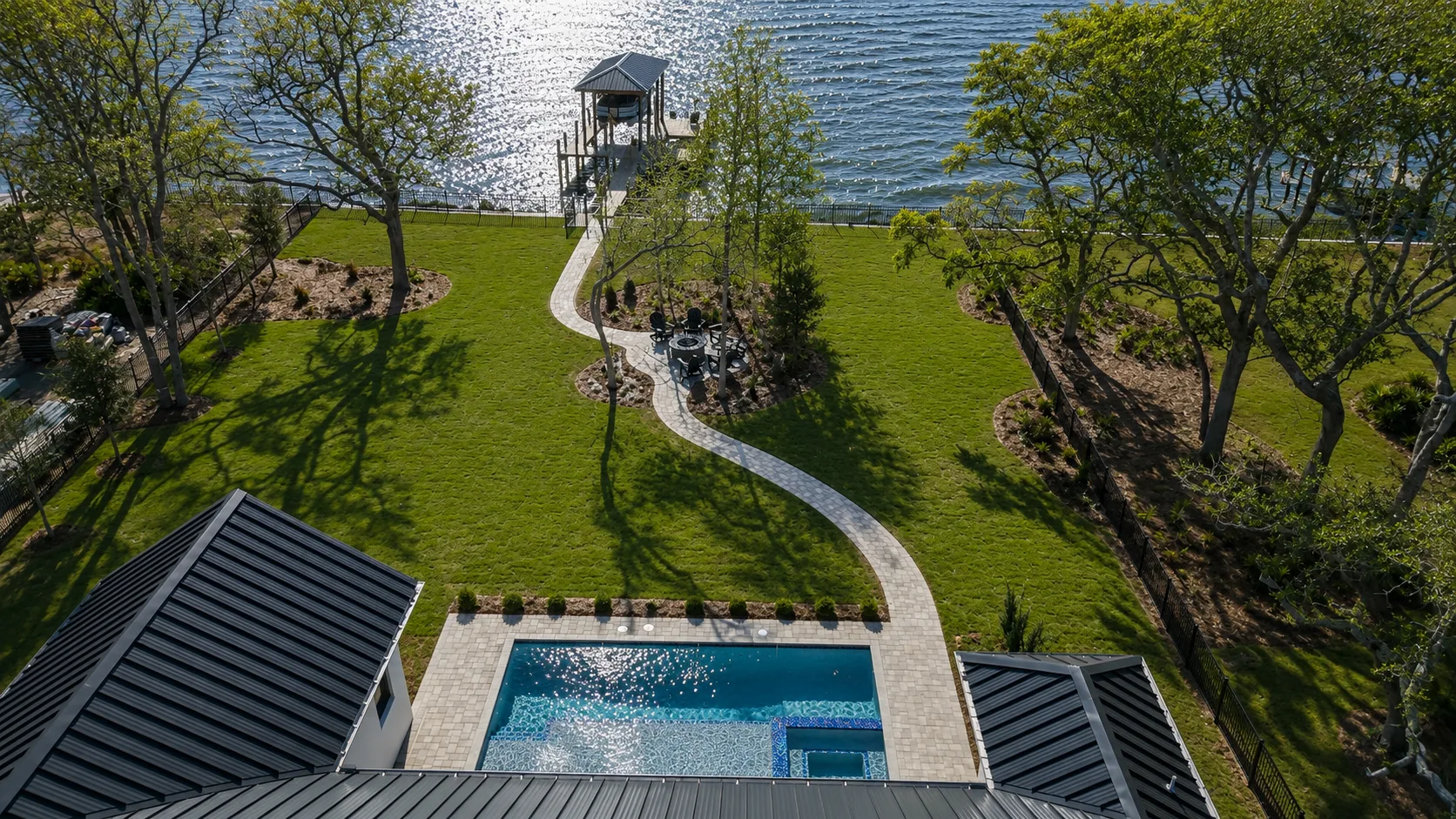 Aerial view of a custom backyard pool built by Neway Pools